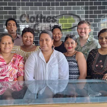 The Clothes For Good Fiji team at the store counter